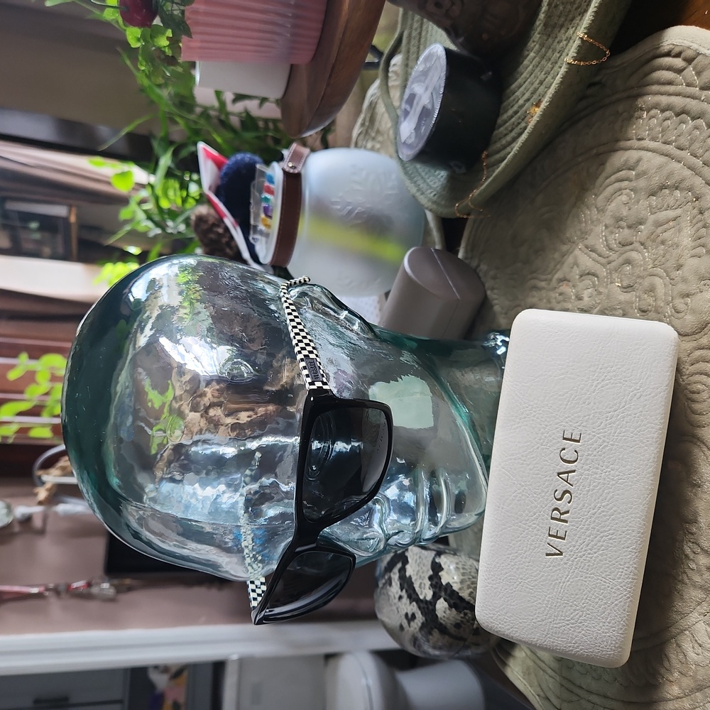 Versace sunglasses gently used. Like new